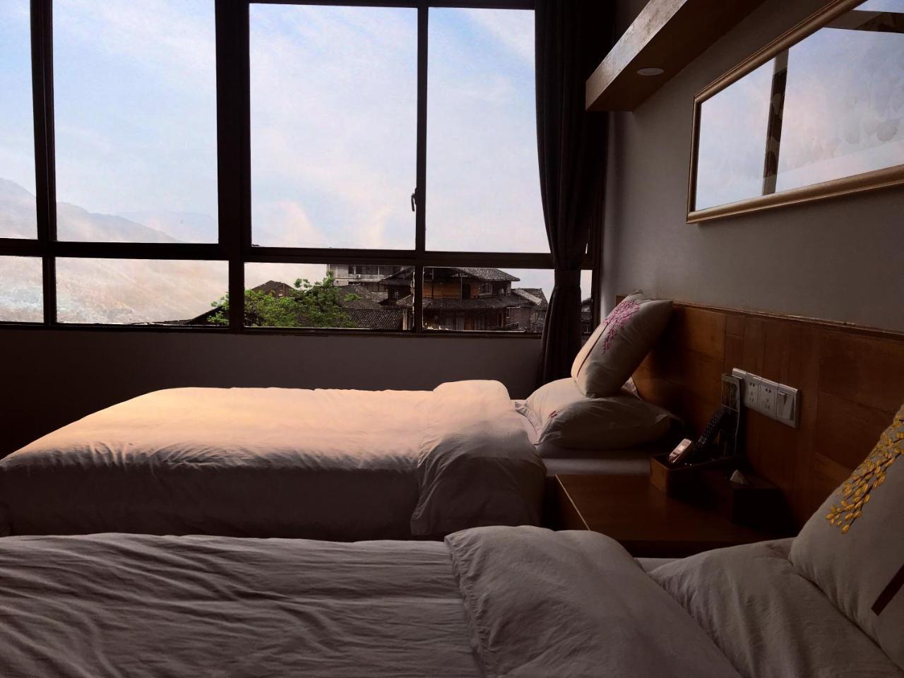 Travelling With Hotel Long Ji Ping An Longsheng Exterior photo